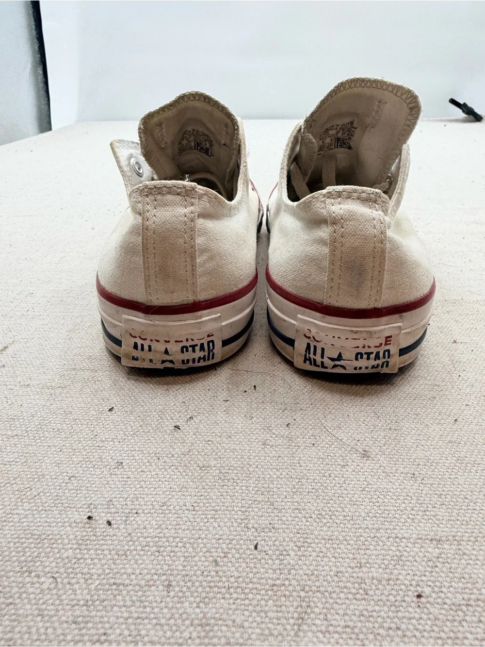 Converse White Low Top Sneakers with Red Trim